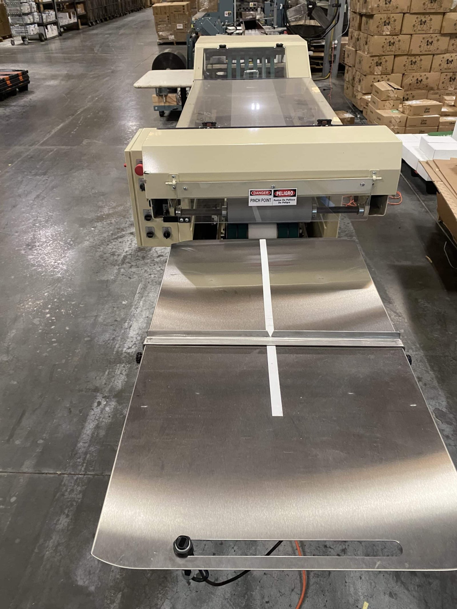 NEDCO E‑Z Fold 2000‑S Automatic Textile Folder – 1,000/hr, Bagging + Heat Seal, OEM Verified