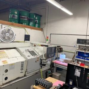 Okuma ES L8 CNC Lathe, 1999 – Tailstock, Chip Conveyor