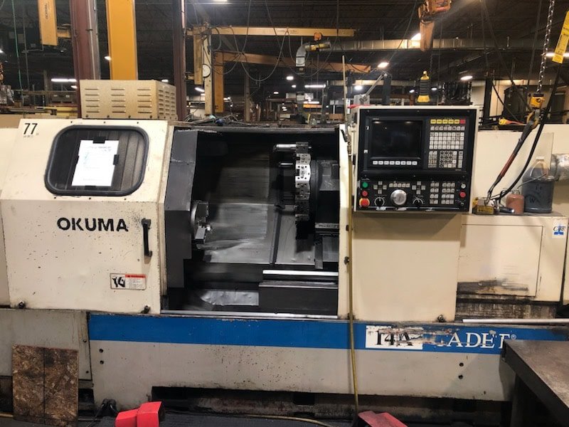 Okuma L1420 CNC Lathe, 1995 – Tailstock, Chip Conveyor