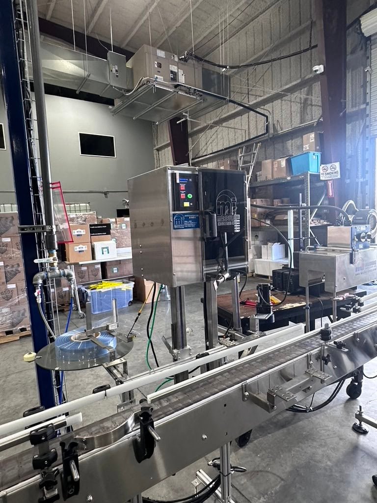 Inline Filling Systems Complete Used Bottling & Labeling Line for Spirits (GNS 80 Proof Vodka) – Labeler, Filler, Capper, Conveyor, Heat Tunnel, Turntables & More – C1D2 Hazardous Location Rated, 2024 - Image 13