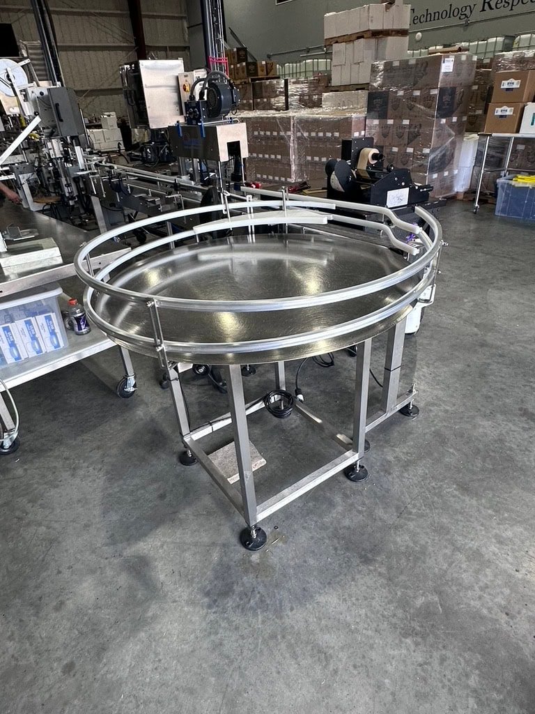 Inline Filling Systems Complete Used Bottling & Labeling Line for Spirits (GNS 80 Proof Vodka) – Labeler, Filler, Capper, Conveyor, Heat Tunnel, Turntables & More – C1D2 Hazardous Location Rated, 2024 - Image 15