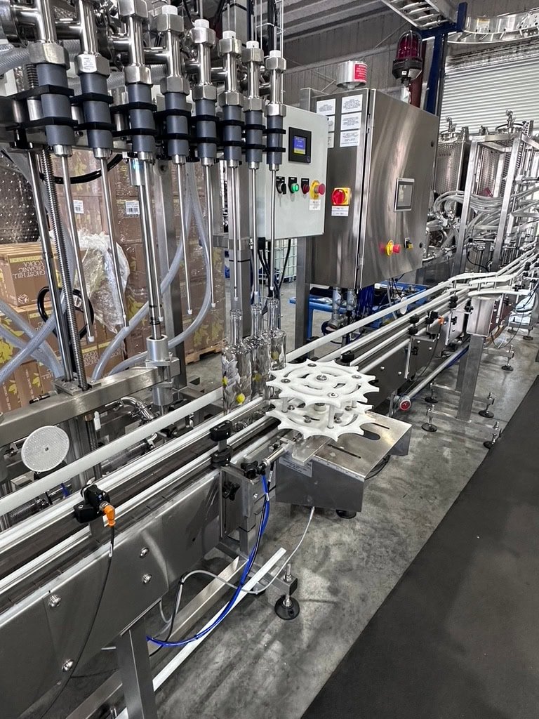 Inline Filling Systems Complete Used Bottling & Labeling Line for Spirits (GNS 80 Proof Vodka) – Labeler, Filler, Capper, Conveyor, Heat Tunnel, Turntables & More – C1D2 Hazardous Location Rated, 2024 - Image 2