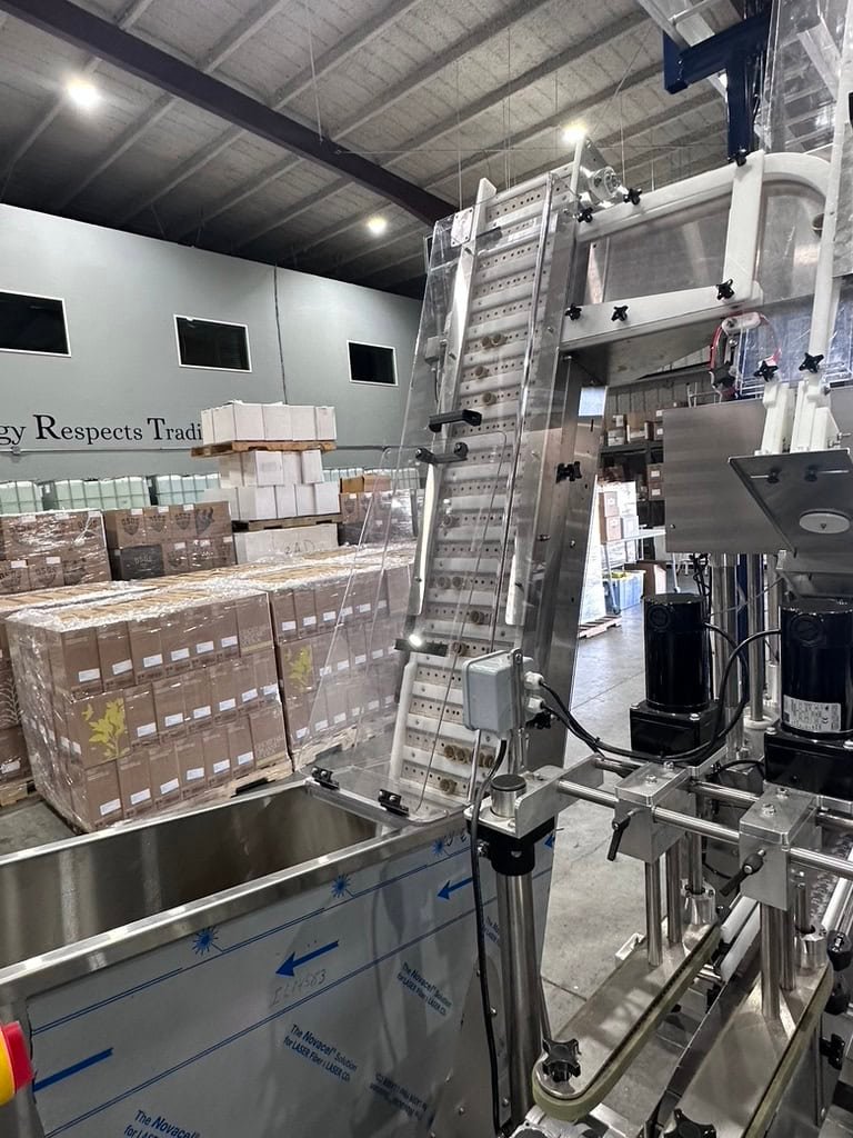 Inline Filling Systems Complete Used Bottling & Labeling Line for Spirits (GNS 80 Proof Vodka) – Labeler, Filler, Capper, Conveyor, Heat Tunnel, Turntables & More – C1D2 Hazardous Location Rated, 2024 - Image 9
