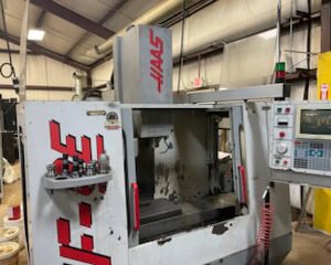 Haas VF0E VMC, 1995 – Chip Auger, 20 ATC