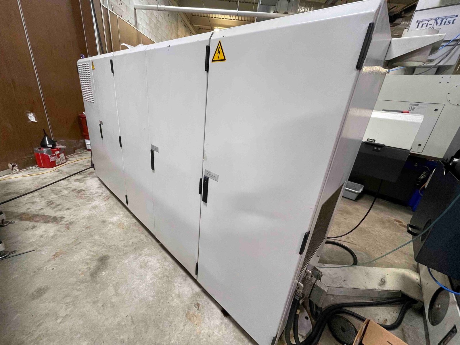 Traub TNL26 CNC Swiss Lathe, 2001- LNS Bar Feeder, Mist Collector, Conveyor, 34 Stations, Live Tools - Image 8