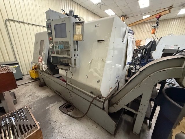 Haas SL-30TB Big Bore Lathe, 2003 – Tailstock, Chip Conveyor, Known Issue